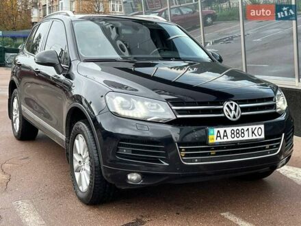 Черный Фольксваген Туарег, объемом двигателя 3 л и пробегом 433 тыс. км за 16700 $, фото 1 на Automoto.ua