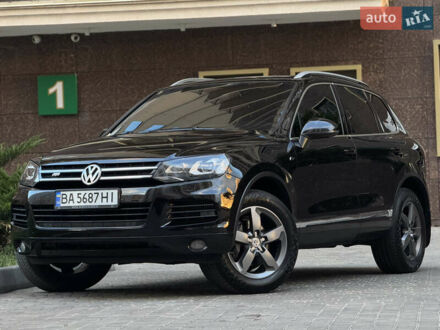 Черный Фольксваген Туарег, объемом двигателя 3 л и пробегом 250 тыс. км за 19000 $, фото 1 на Automoto.ua