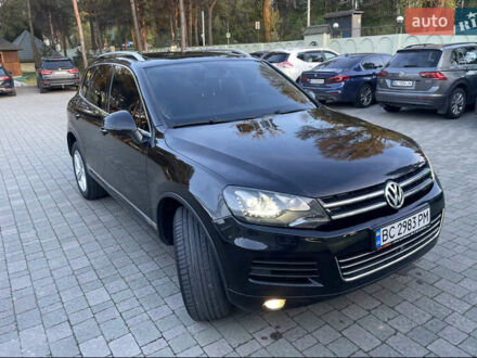 Фольксваген Туарег 2012 у Ужгороді на Automoto.ua Чорний Фольксваген Туарег, об'ємом двигуна 2.97 л та пробігом 268 тис. км за 18000 $, фото 1 на Automoto.ua