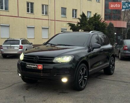 Черный Фольксваген Туарег, объемом двигателя 3 л и пробегом 308 тыс. км за 16490 $, фото 1 на Automoto.ua