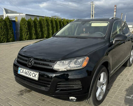 Чорний Фольксваген Туарег, об'ємом двигуна 2.97 л та пробігом 382 тис. км за 16700 $, фото 1 на Automoto.ua