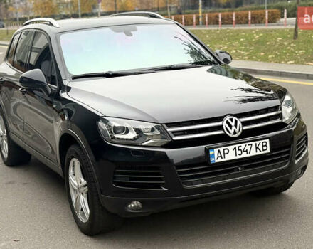 Черный Фольксваген Туарег, объемом двигателя 3 л и пробегом 220 тыс. км за 19700 $, фото 1 на Automoto.ua