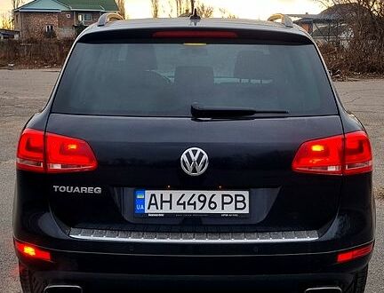 Фольксваген Туарег 2012 у Кременчуге на Automoto.ua Чорний Фольксваген Туарег, об'ємом двигуна 3 л та пробігом 252 тис. км за 18900 $, фото 1 на Automoto.ua