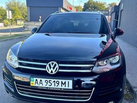 Черный Фольксваген Туарег, объемом двигателя 3 л и пробегом 242 тыс. км за 18750 $, фото 1 на Automoto.ua