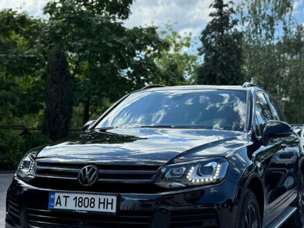 Чорний Фольксваген Туарег, об'ємом двигуна 3 л та пробігом 343 тис. км за 19900 $, фото 1 на Automoto.ua