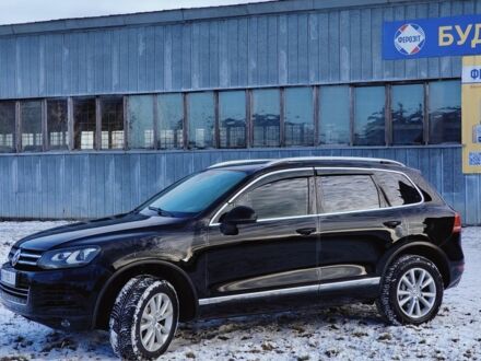 Черный Фольксваген Туарег, объемом двигателя 3 л и пробегом 325 тыс. км за 13999 $, фото 1 на Automoto.ua