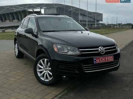 Черный Фольксваген Туарег, объемом двигателя 2.97 л и пробегом 299 тыс. км за 18700 $, фото 1 на Automoto.ua