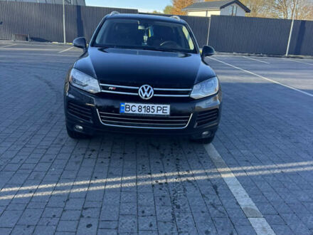 Черный Фольксваген Туарег, объемом двигателя 3 л и пробегом 285 тыс. км за 17000 $, фото 1 на Automoto.ua