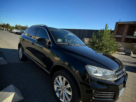 Черный Фольксваген Туарег, объемом двигателя 3 л и пробегом 213 тыс. км за 22300 $, фото 1 на Automoto.ua