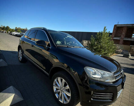 Черный Фольксваген Туарег, объемом двигателя 3 л и пробегом 213 тыс. км за 22300 $, фото 1 на Automoto.ua