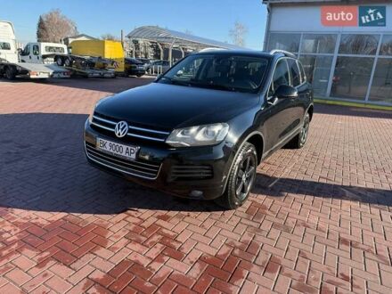 Черный Фольксваген Туарег, объемом двигателя 2.97 л и пробегом 298 тыс. км за 20799 $, фото 1 на Automoto.ua