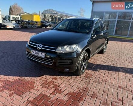 Черный Фольксваген Туарег, объемом двигателя 2.97 л и пробегом 298 тыс. км за 20799 $, фото 1 на Automoto.ua