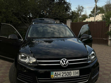 Черный Фольксваген Туарег, объемом двигателя 2.97 л и пробегом 342 тыс. км за 18000 $, фото 1 на Automoto.ua