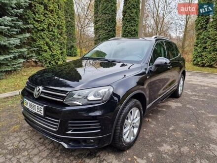 Черный Фольксваген Туарег, объемом двигателя 3 л и пробегом 209 тыс. км за 24999 $, фото 1 на Automoto.ua