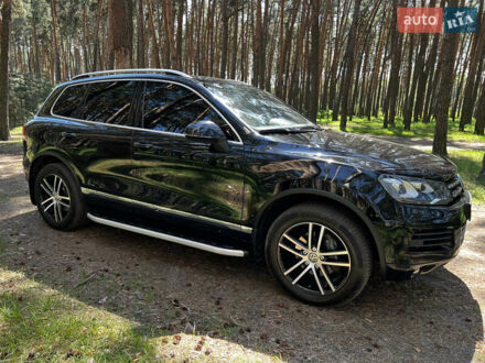 Черный Фольксваген Туарег, объемом двигателя 3 л и пробегом 184 тыс. км за 24000 $, фото 1 на Automoto.ua