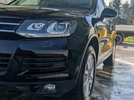 Черный Фольксваген Туарег, объемом двигателя 3 л и пробегом 214 тыс. км за 28000 $, фото 1 на Automoto.ua