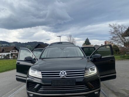 Черный Фольксваген Туарег, объемом двигателя 3 л и пробегом 164 тыс. км за 31466 $, фото 1 на Automoto.ua