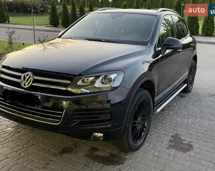 Чорний Фольксваген Туарег, об'ємом двигуна 3 л та пробігом 220 тис. км за 24500 $, фото 1 на Automoto.ua