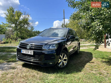 Черный Фольксваген Туарег, объемом двигателя 2.97 л и пробегом 183 тыс. км за 26500 $, фото 1 на Automoto.ua
