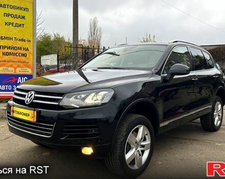 Черный Фольксваген Туарег, объемом двигателя 3 л и пробегом 239 тыс. км за 23500 $, фото 1 на Automoto.ua