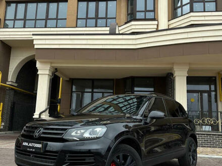 Черный Фольксваген Туарег, объемом двигателя 2.97 л и пробегом 272 тыс. км за 20000 $, фото 1 на Automoto.ua