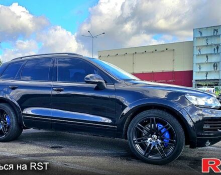 Черный Фольксваген Туарег, объемом двигателя 4.2 л и пробегом 330 тыс. км за 19999 $, фото 1 на Automoto.ua