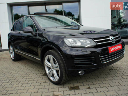 Черный Фольксваген Туарег, объемом двигателя 3 л и пробегом 236 тыс. км за 24999 $, фото 1 на Automoto.ua