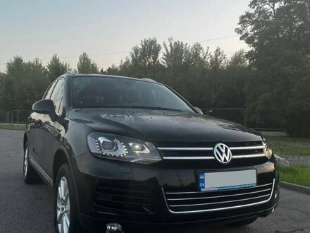 Черный Фольксваген Туарег, объемом двигателя 3 л и пробегом 221 тыс. км за 24516 $, фото 1 на Automoto.ua
