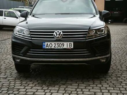 Черный Фольксваген Туарег, объемом двигателя 2.97 л и пробегом 300 тыс. км за 24700 $, фото 1 на Automoto.ua