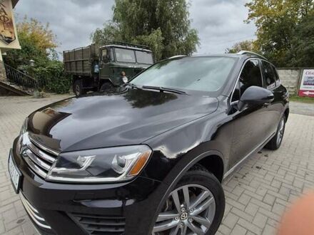 Фольксваген Туарег 2014 в Каменце-Подольском на Automoto.ua Черный Фольксваген Туарег, объемом двигателя 3 л и пробегом 330 тыс. км за 19999 $, фото 1 на Automoto.ua