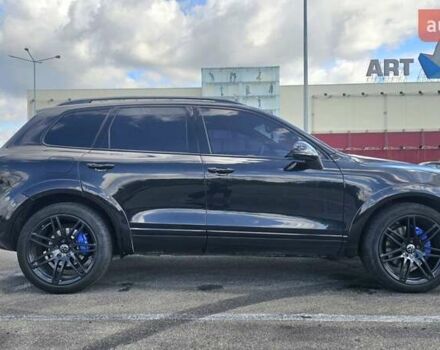 Черный Фольксваген Туарег, объемом двигателя 4.13 л и пробегом 335 тыс. км за 21500 $, фото 1 на Automoto.ua
