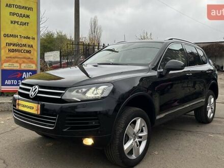 Черный Фольксваген Туарег, объемом двигателя 2.97 л и пробегом 239 тыс. км за 23500 $, фото 1 на Automoto.ua