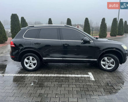 Черный Фольксваген Туарег, объемом двигателя 3 л и пробегом 265 тыс. км за 21500 $, фото 1 на Automoto.ua