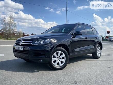 Черный Фольксваген Туарег, объемом двигателя 3 л и пробегом 223 тыс. км за 25500 $, фото 1 на Automoto.ua