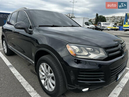 Черный Фольксваген Туарег, объемом двигателя 2.97 л и пробегом 140 тыс. км за 24500 $, фото 1 на Automoto.ua