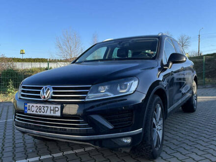 Черный Фольксваген Туарег, объемом двигателя 2.97 л и пробегом 225 тыс. км за 27500 $, фото 1 на Automoto.ua