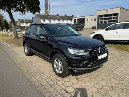 Черный Фольксваген Туарег, объемом двигателя 3 л и пробегом 74 тыс. км за 7000 $, фото 1 на Automoto.ua