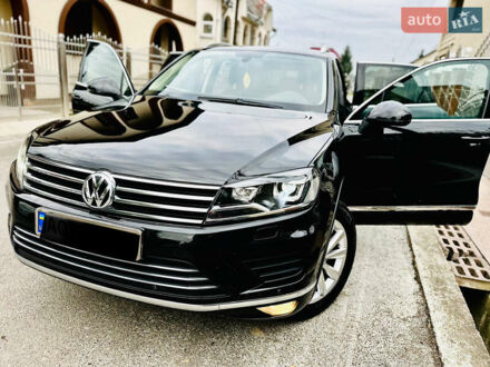 Чорний Фольксваген Туарег, об'ємом двигуна 3 л та пробігом 297 тис. км за 19500 $, фото 1 на Automoto.ua