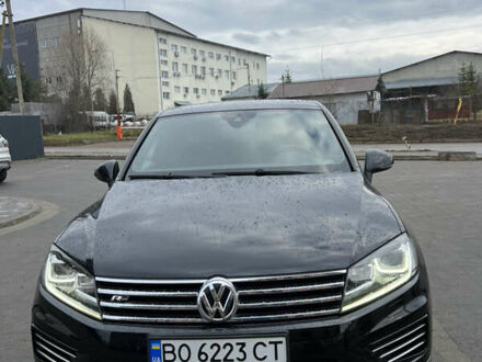 Черный Фольксваген Туарег, объемом двигателя 3 л и пробегом 149 тыс. км за 29300 $, фото 1 на Automoto.ua