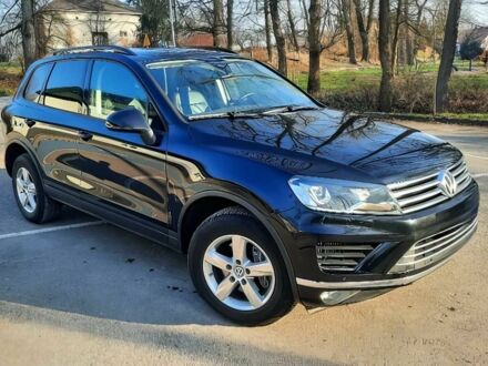 Черный Фольксваген Туарег, объемом двигателя 3 л и пробегом 76 тыс. км за 9300 $, фото 1 на Automoto.ua