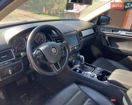 Черный Фольксваген Туарег, объемом двигателя 3 л и пробегом 250 тыс. км за 29500 $, фото 1 на Automoto.ua