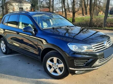 Черный Фольксваген Туарег, объемом двигателя 3 л и пробегом 76 тыс. км за 5600 $, фото 1 на Automoto.ua