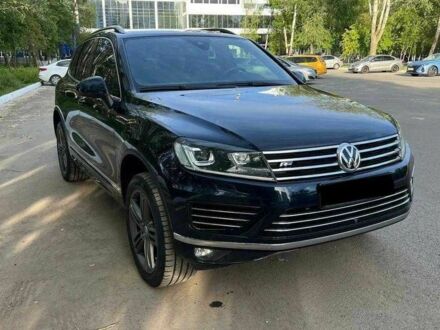 Черный Фольксваген Туарег, объемом двигателя 3 л и пробегом 174 тыс. км за 20000 $, фото 1 на Automoto.ua