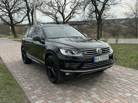 Черный Фольксваген Туарег, объемом двигателя 3 л и пробегом 213 тыс. км за 27900 $, фото 1 на Automoto.ua