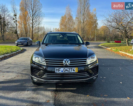 Черный Фольксваген Туарег, объемом двигателя 3 л и пробегом 253 тыс. км за 28550 $, фото 1 на Automoto.ua