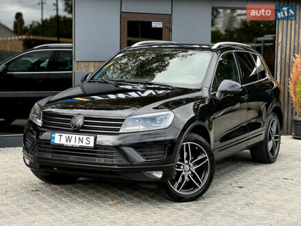Черный Фольксваген Туарег, объемом двигателя 3 л и пробегом 250 тыс. км за 20900 $, фото 1 на Automoto.ua
