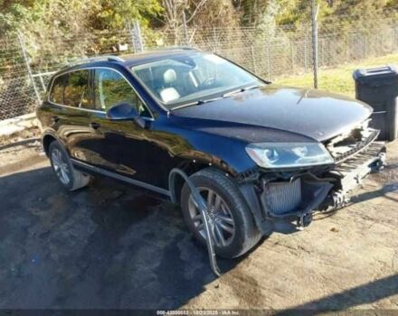 Черный Фольксваген Туарег, объемом двигателя 3 л и пробегом 170 тыс. км за 3000 $, фото 1 на Automoto.ua