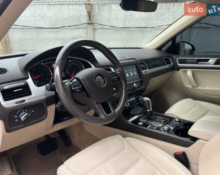 Черный Фольксваген Туарег, объемом двигателя 3 л и пробегом 193 тыс. км за 26900 $, фото 1 на Automoto.ua