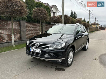 Черный Фольксваген Туарег, объемом двигателя 3 л и пробегом 218 тыс. км за 26800 $, фото 1 на Automoto.ua