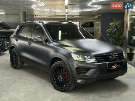 Черный Фольксваген Туарег, объемом двигателя 3 л и пробегом 162 тыс. км за 32900 $, фото 1 на Automoto.ua